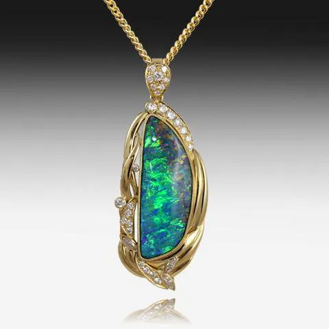 18kt Yellow Gold Boulder Opal and Diamond pendant