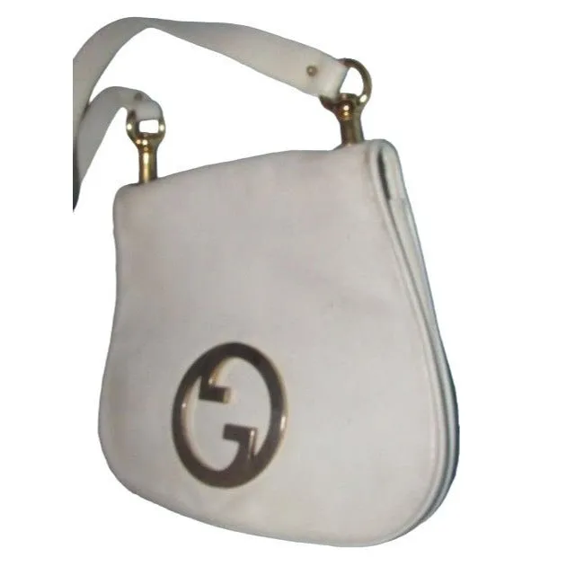 Vintage 1970s Gucci white textured leather Blondie style saddle bag with XL gold GG logo cutout in mint condition