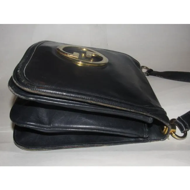 Vintage Gucci midnight blue leather 'Blondie' saddle style, shoulder bag with large, gold 'GG' emblem & multiple compartments