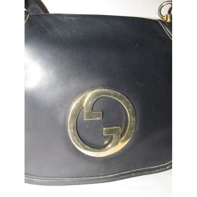 Vintage Gucci midnight blue leather 'Blondie' saddle style, shoulder bag with large, gold 'GG' emblem & multiple compartments