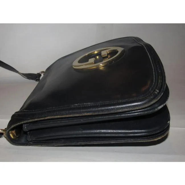 Vintage Gucci midnight blue leather 'Blondie' saddle style, shoulder bag with large, gold 'GG' emblem & multiple compartments